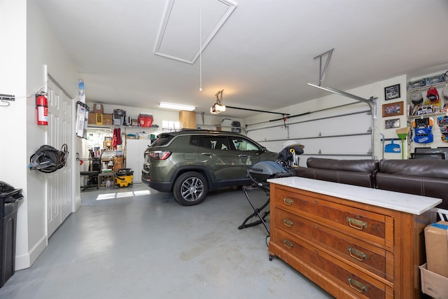 23380 Elmwood Ln, Live Oak, FL 32064 - garage featuring a garage door opener