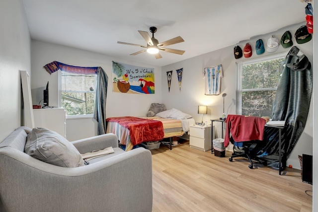 bedroom featuring ceiling fan and light wood-type flooring