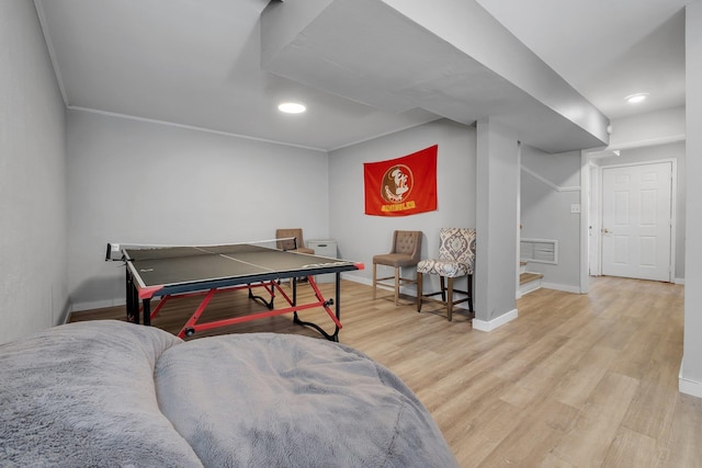 recreation room with light wood finished floors, baseboards, visible vents, and recessed lighting