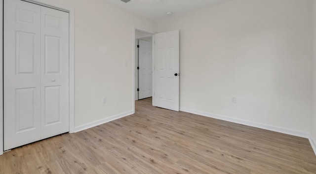 1115 Joe Louis St, Tallahassee, FL 32304 - unfurnished bedroom with light wood-type flooring and a closet