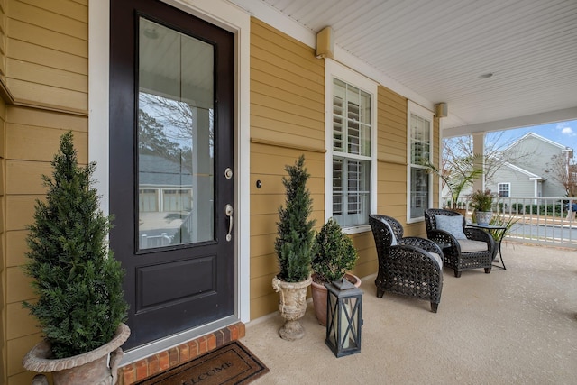 property entrance featuring a porch