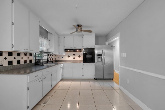 kitchen featuring black appliances, ceiling fan, white cabinets, and sink