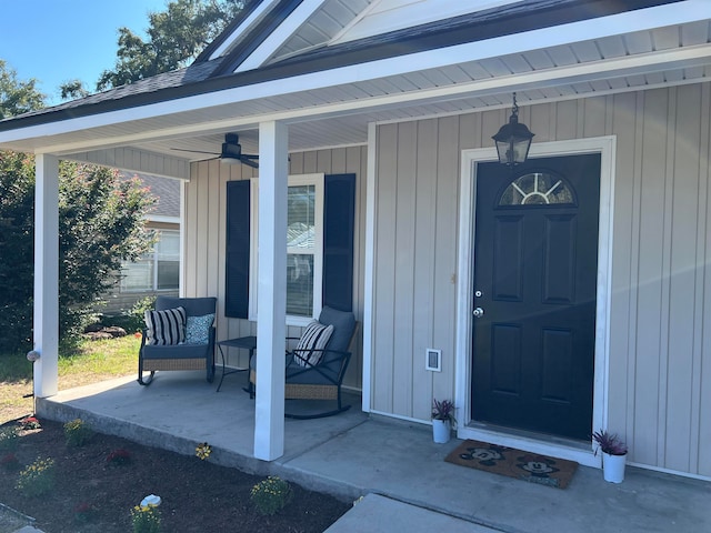 view of exterior entry with covered porch