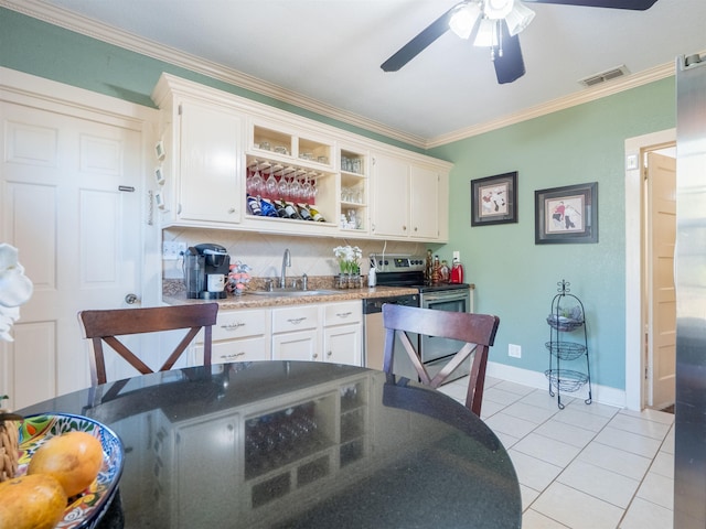 kitchen with sink, white cabinetry, ornamental molding, and electric stove