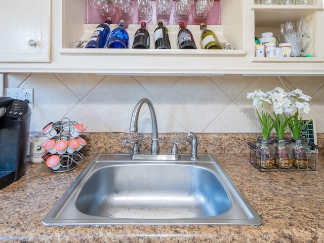 kitchen with sink and backsplash