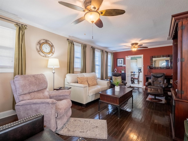 living room featuring ornamental molding, dark hardwood / wood-style flooring, and ceiling fan