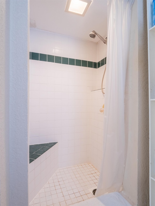 bathroom with curtained shower