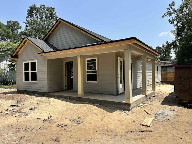1125 E Dogwood St, Monticello, FL 32344 - view of front of house featuring roof with shingles and a porch