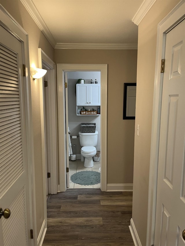 1045 Martin St, Tallahassee, FL 32303 - corridor featuring dark wood-style floors and ornamental molding