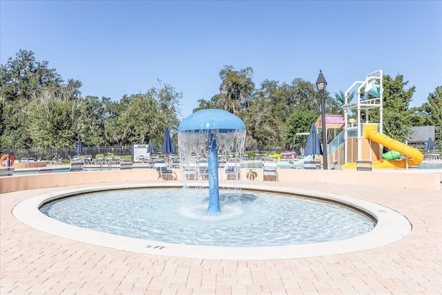 surrounding community featuring a playground