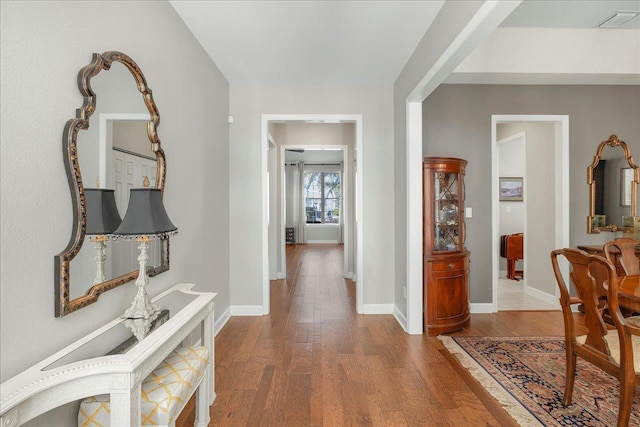 corridor featuring hardwood / wood-style flooring