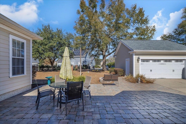 view of patio / terrace with a garage