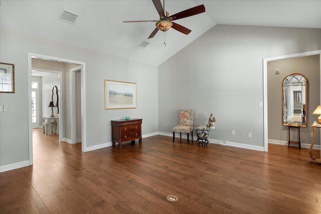 sitting room featuring ceiling fan, lofted ceiling, and dark hardwood / wood-style flooring