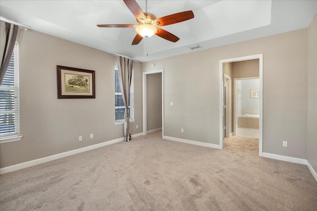 unfurnished bedroom with light carpet and ceiling fan