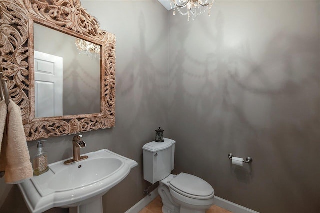 bathroom featuring sink and toilet