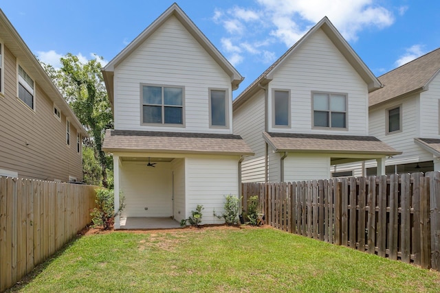 1261 N Duval St, Tallahassee, FL 32303 - rear view of house featuring a ceiling fan, roof with shingles, and a patio