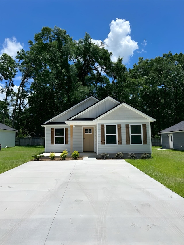 71 Chickat Trl, Crawfordville, FL 32327 - view of front of home featuring board and batten siding