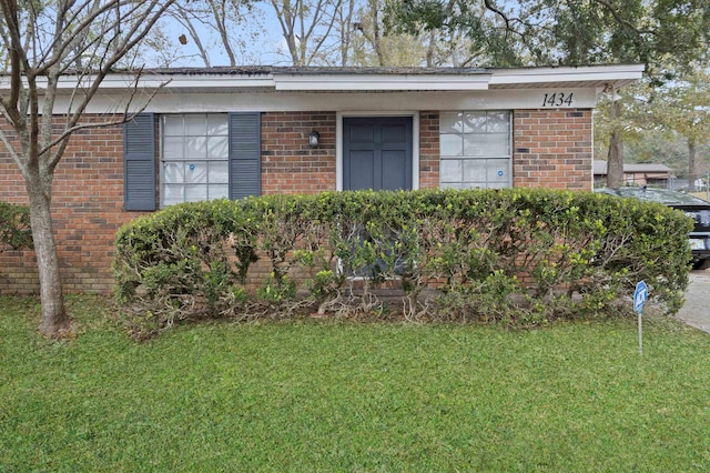 exterior space with a lawn