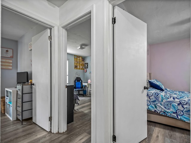 corridor with wood finished floors