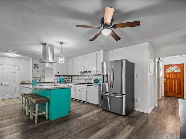 kitchen with a sink, dark wood-style floors, white dishwasher, stainless steel fridge with ice dispenser, and extractor fan