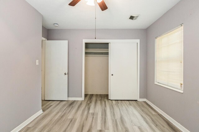405 Mercury Dr, Tallahassee, FL 32305 - unfurnished bedroom featuring wood finished floors, a closet, and ceiling fan