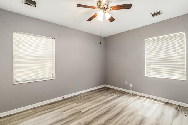 405 Mercury Dr, Tallahassee, FL 32305 - spare room with wood finished floors and ceiling fan