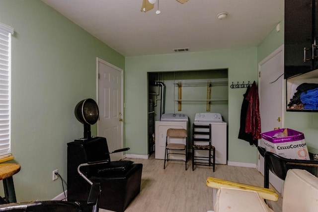405 Mercury Dr, Tallahassee, FL 32305 - interior space featuring light wood finished floors, washing machine and clothes dryer, and a closet