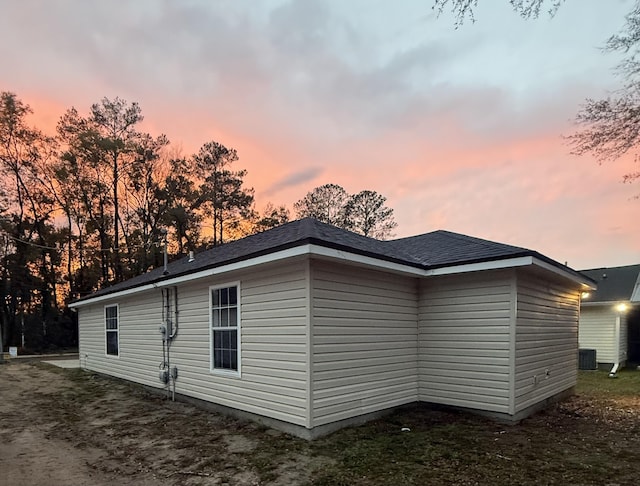 view of property exterior at dusk