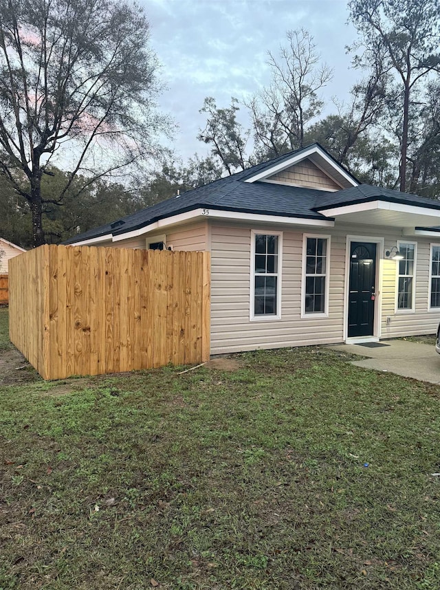 exterior space with a yard