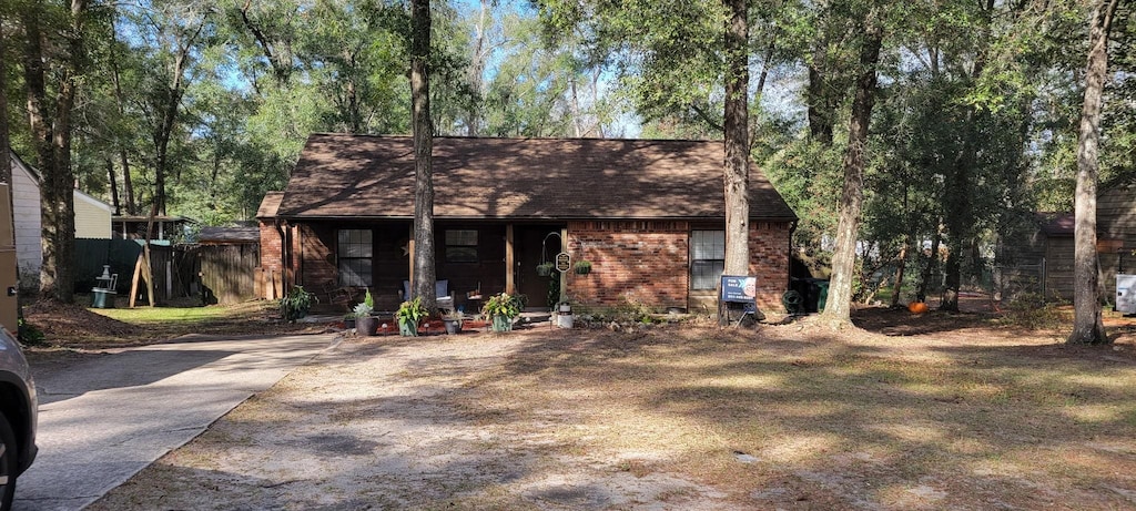 view of front of home with brick siding