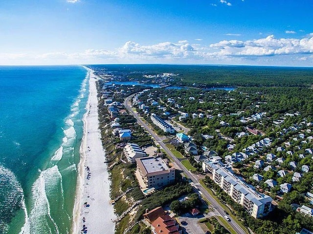 aerial view featuring a view of the beach and a water view