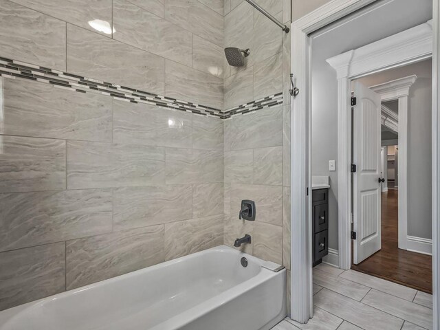 bathroom featuring shower / bath combination and vanity