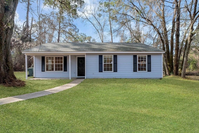 single story home with a front yard