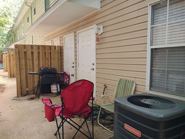 view of patio featuring central AC and a grill