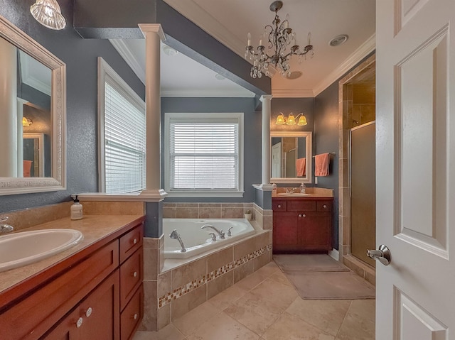 bathroom featuring ornate columns, a sink, and ornamental molding