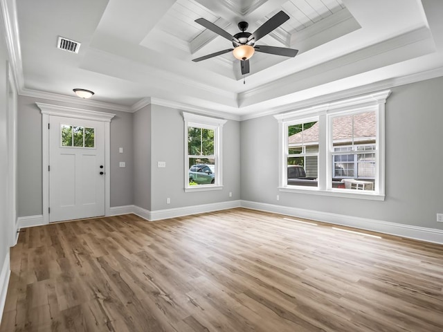 foyer featuring ceiling fan, plenty of natural light, light hardwood / wood-style flooring, and ornamental molding