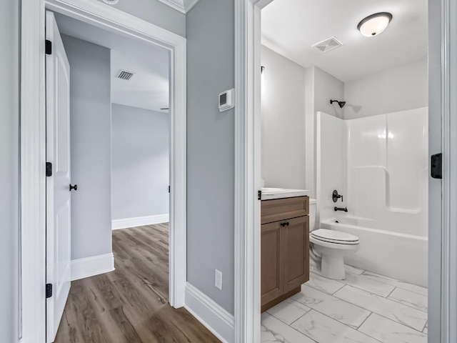 full bathroom featuring vanity, toilet, and shower / washtub combination