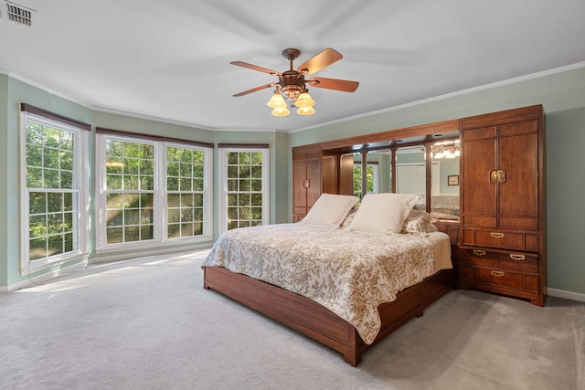 1961 Chatsworth Way, Tallahassee, FL 32309 - bedroom featuring carpet, crown molding, multiple windows, and a ceiling fan
