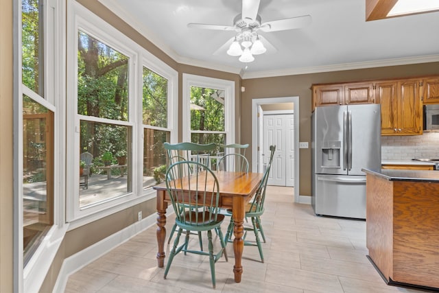 1961 Chatsworth Way, Tallahassee, FL 32309 - dining space featuring a ceiling fan and crown molding