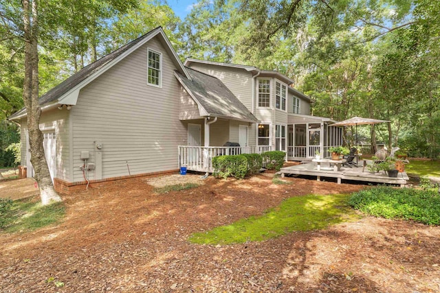 1961 Chatsworth Way, Tallahassee, FL 32309 - back of property with a sunroom and a deck