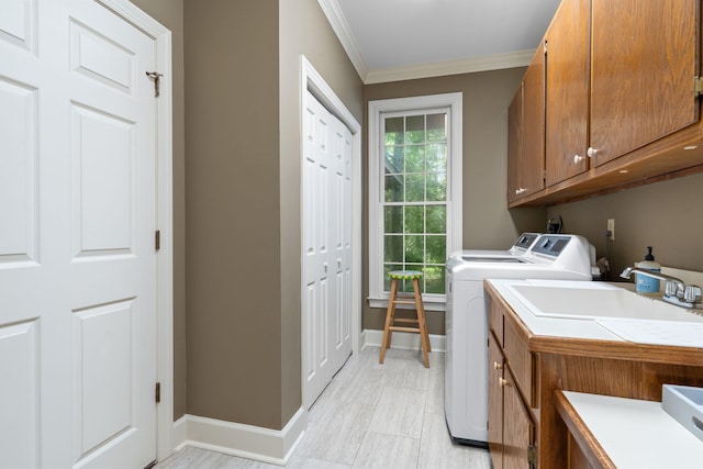 1961 Chatsworth Way, Tallahassee, FL 32309 - laundry area with cabinet space, washing machine and dryer, and ornamental molding