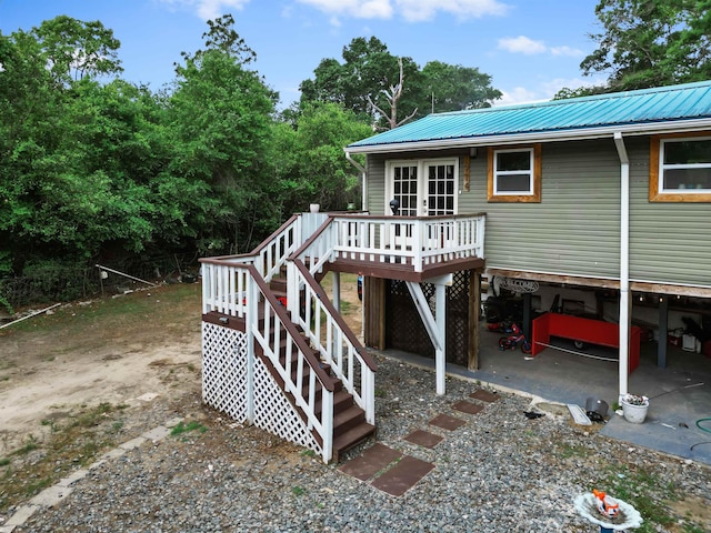 exterior space with french doors and stairs