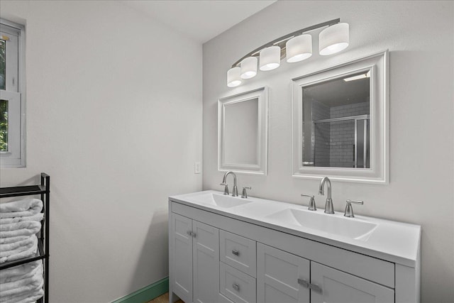 bathroom with vanity and walk in shower