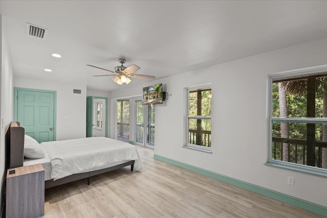 bedroom featuring ceiling fan, access to outside, and light wood-type flooring