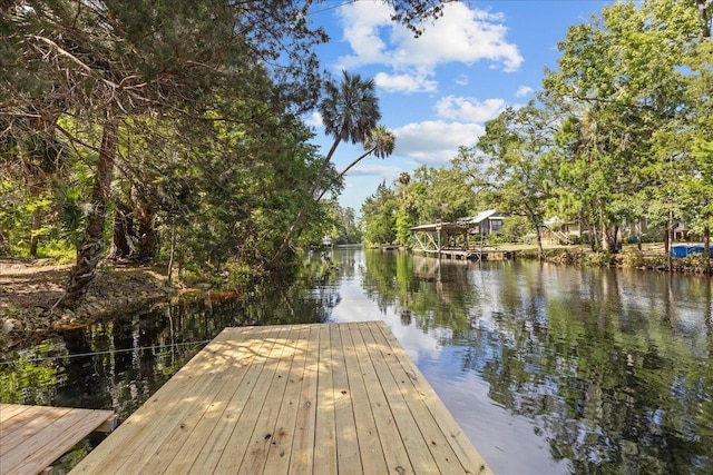 view of dock featuring a water view