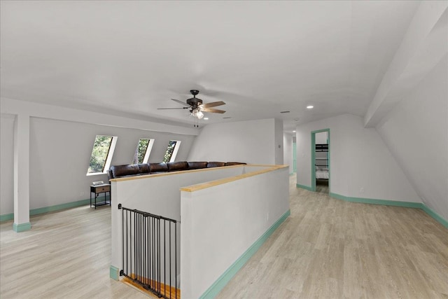 interior space featuring ceiling fan and light wood-type flooring