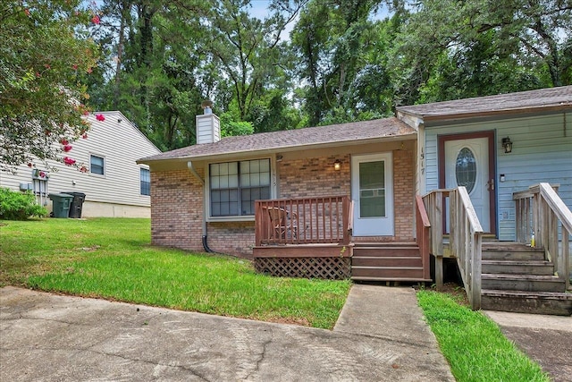 1515 Merry Oaks Ct, Tallahassee, FL 32303 - view of front of house featuring brick siding, a front yard, and a chimney