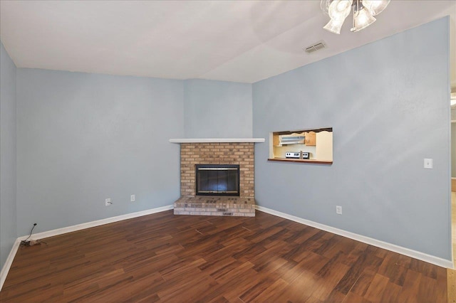 1515 Merry Oaks Ct, Tallahassee, FL 32303 - unfurnished living room featuring wood finished floors and a fireplace