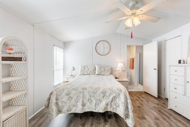 bedroom with lofted ceiling, wood finished floors, and ceiling fan