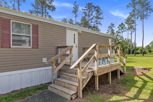 deck featuring a lawn